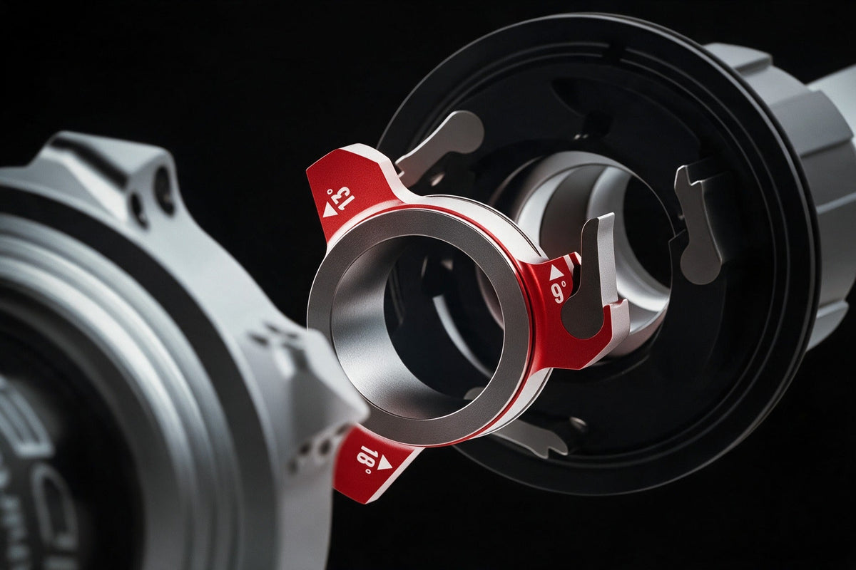 Inside a Sidekick 2.0 hub, the red pawl-pusher ring, marked 9, 13 and 18 degrees, between the freehub body and the hub shell.
