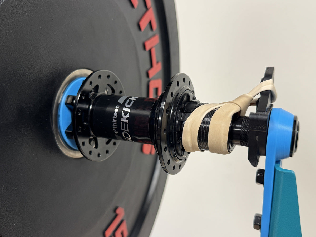 An e*thirteen Sidekick hub mounted on the weighted plate for the spin-down test.