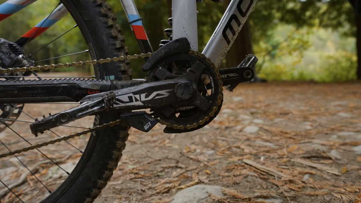 The drivetrain side of a demo bike, e*thirteen cranks and a Sidekick rear wheel.